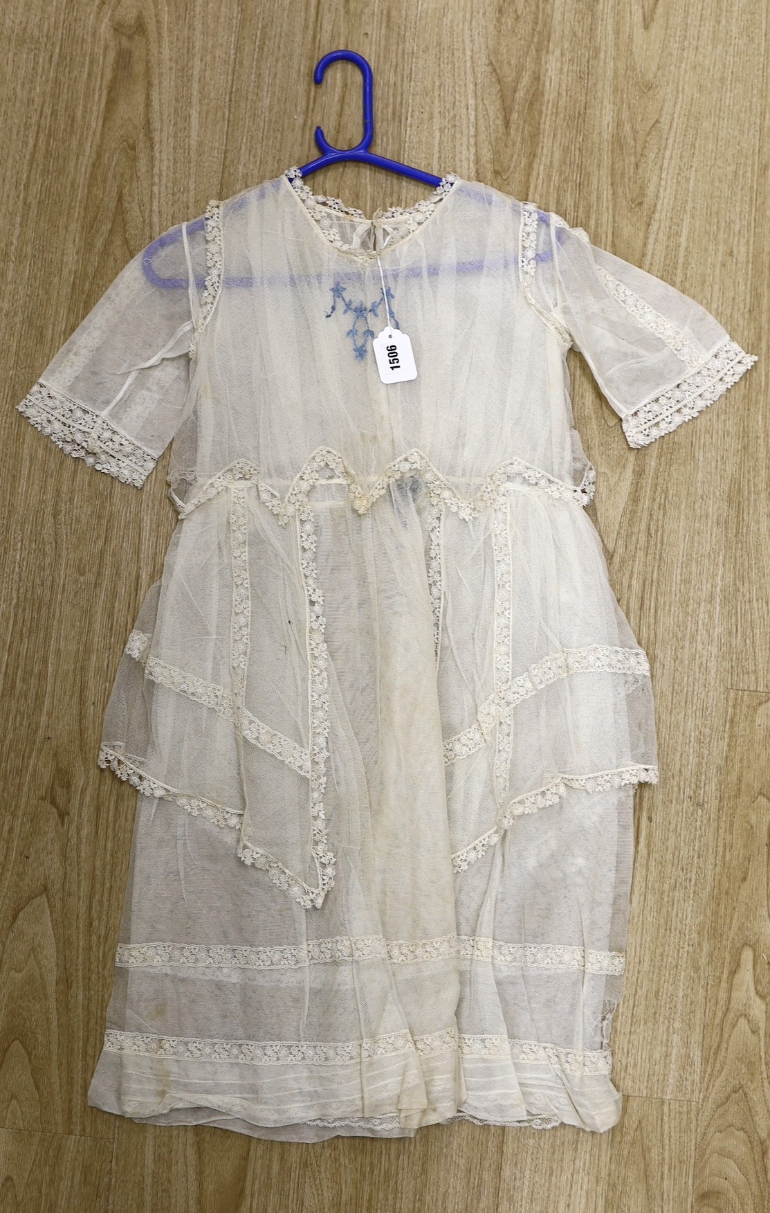 A young girl's 1920's-30's cream net and lace trimmed confirmation dress